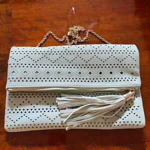 lazor cut clutch cross body bag seafoam green with Tassel zipper snap spacious